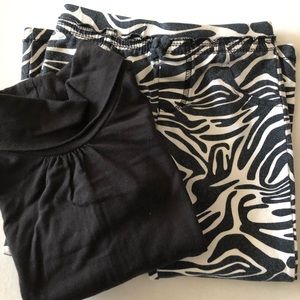Black turtleneck and Zebra 🦓 pants